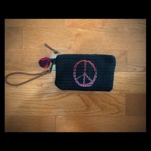 The Sak Wristlet with portable phone charger